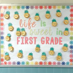 a bulletin board that says life is sweet in first grade surrounded by pineapples