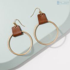 Trendy Metal Wrap Earrings, Chic Brown Earrings For Party, Modern Brown Jewelry For Parties, Trendy Brown Hoop Earrings For Everyday, Trendy Nickel-free Wrap Earrings, Trendy Brown Jewelry With Ear Wire, Chic Circle Earrings For Everyday, Trendy Brown Earrings For Party, Chic Everyday Circular Earrings