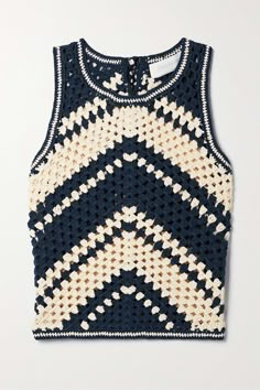 a knitted tank top with an abstract pattern on the front and back, made from yarn