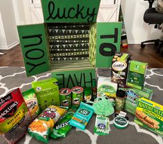 an assortment of snacks are displayed on the floor