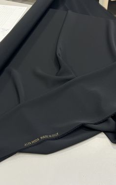 ITALIAN VISCOSE FABRIC - Double Crepe Cady Designer Italian fashion fabric viscose double crepe with a color black .Viscose is soft and pleasant in touching. Our luxurious viscose crepe cady fabric is perfect for sewing garments such as dresses, skirts or blouse. Fabric composition: 97% viscose 3% elastan Weight: 290 gr MADE IN ITALY Please note that the real color might be slightly different from what you see on your monitors CUT TO ORDER Over 1 meters will be sent in continuous one piece, unless otherwise stated or requested. Should you need any special length, we are always happy to issue a customized listing specially for you! Sewing Garments, Pattern Drafting, Moda Fabrics, Italian Fabric, Viscose Fabric, Fashion Fabric, Luxury Fabrics, Italian Fashion, Beautiful Fabric