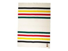 a white towel with multi colored stripes on it