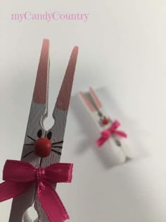 a pair of scissors that are shaped like a bunny with a bow on its head