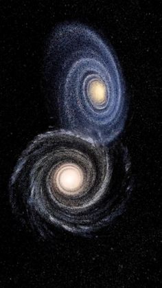 two spirals are shown in the night sky