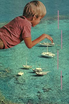 a young boy flying over boats in the ocean