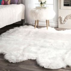 a white rug on the floor in a room