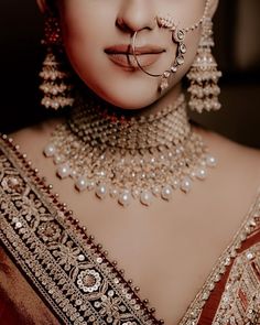 Latest Bridal Nath Designs For Indian Brides Bridal Nath Designs, Nose Pin Indian, Nath Bridal, Bridal Nath, Indian Brides Jewelry, Nose Ring Designs, Nose Jewels, Bridal Ornaments