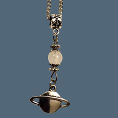 This Planet Saturn Charm Necklace Is A Unique Piece Of Space-Themed Jewelry. It Features A 26-Inch Silver Metal Chain With A Beautiful Saturn Charm, Perfect For Astronomy Enthusiasts. Silver Metal Chain (26 Inches) Planet Saturn Charm Space-Themed Design Condition: New With Tags Ships Same Or Next Day Saturn Charm, Astronomy Jewelry, Charm Ideas, Space Necklace, Saturn Planet, Planet Saturn, Room Stuff, Phone Charms, Space Theme