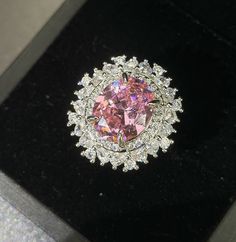 ✰ This delicate lab-created pink gift ring is perfect for people who want to achieve a brilliant and splendid look ✰  Not only for everyday wear, this dainty pink cz ring is also great for weddings and also as a bridesmaid ring ✰ This oval cz ring pink is a very special gift for birthday, Mother's Day, bridesmaids, Valentine's Day and more  ✰ Comes with an exquisite gift box We also offer the necklace and earring from the same collection:  https://www.etsy.com/listing/1222004885/vintage-pink-oval-necklace-pink-zircon https://www.etsy.com/listing/1222001683/pink-drop-earring-with-halo-oval-zircon Materials: Environmentally-friendly brass Quantity: 1 Piece Ring Size: 0.85 x 0.8 in Main Gemstone Size: 0.47 x 0.4 in ----♛ PRODUCTION & SHIPPING ♛ --- ✰Multiple items purchased in one payment can Formal Pink Cluster Ring With Brilliant Cut, Pink Diamond Ring With Halo Setting For Formal Events, Pink Diamond Ring With Halo Setting For Formal Occasions, Luxury Pink Cubic Zirconia Wedding Jewelry, Pink Cubic Zirconia Halo Ring For Wedding, Pink Diamond Open Ring Jewelry, Luxury Pink Rings With Halo Design, Pink Round Cluster Ring With Prong Setting, Pink Round Cluster Ring With Halo Setting