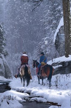 two people riding horses across a snow covered creek in the woods on a snowy day