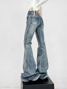 Infuse your wardrobe with a dash of rebellion with our Layered-Effect Denim Flare-Leg Jeans, complete with a grommet belt detail for that extra edge. Crafted from premium denim, these jeans are characterized by their layered look and skinny yet flared silhouette, promising to deliver both comfort and attitude. The intricate grommet belt detail not only accentuates the waist but also adds a unique, punk-inspired aesthetic that sets these jeans apart from the ordinary. Elevate your casual daywear Fitted Punk Style Denim Jeans, Edgy Mid-rise Medium Wash Flare Jeans, Wide Leg Punk Jeans For Spring, Punk Wide Leg Jeans For Spring, Fall Festival Denim Flare Jeans, Urban Fitted Jeans With Frayed Hem, Fitted Dark Wash Punk Jeans, Distressed Fitted Urban Flare Jeans, Fitted Punk Jeans In Dark Wash