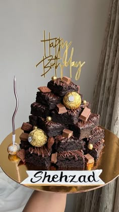 there is a cake that has been made to look like a pile of brownies