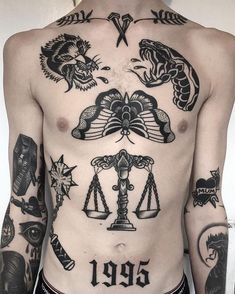 a man with many tattoos on his chest