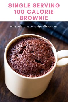 a close up of a cup of coffee on a table with the words single serving 100 calorie brownie