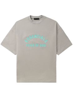 Find FEAR OF GOD Ogo-print Cotton T-shirt on Editorialist. taupe grey cotton logo print to the front round neck short sleeves straight hem Essentials Shirt Outfit, Essentials Outfit, Yellow Graphic Tee, God Logo, Grey Graphic Tee, Cute Online Clothing Stores, Diesel Clothing, Essentials Logo, Outfit Pieces