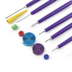 several different types of crochet hooks are shown in this image, including one with an assortment of colors and sizes