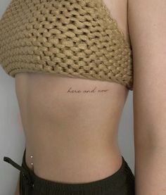 a woman's stomach with the word hope and now written on it in cursive font