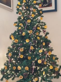 a decorated christmas tree with candy canes and candies