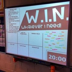 a man standing in front of a white board with words on it that read win whatever i need