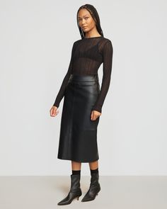 Our latest take on the vegan leather skirt — Briony features a sleek silhouette with a back split for easy movement. We love to style this midi with a cozy sweater for an effortless day-to-night look. See below for our general Size Guide and available measurements Self made of 100% polyurethane, lining made of 100% polyester Machine wash cold and lay flat to dry Vegan Leather Skirt, Black Leather Skirts, Cozy Sweater, Night Looks, Split Hem, Cozy Sweaters, Lay Flat, Leather Skirt, Vegan Leather