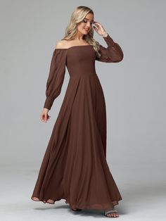 a woman in a long brown dress