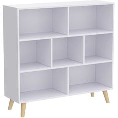 Simple, stylish design yet functional and suitable for any room. Nordic Minimalist Short Bookcase. The bookshelf is rich in colors, and there will be some differences due to the display, light, and other reasons. George Oliver | George Oliver Wooden Open Shelf Bookcase - 3-Tier Floorstanding Display Cabinet Rack w / Legs, 7 Cubes Free Standing Bookshelf in Warm White | 31.5039" W X 9.45" D | Wayfair Free Standing Bookshelf, White Book Shelf, Short Bookcase, Cute Bookshelves, Open Shelf Bookcase, White Bookshelf, Standing Bookshelf, White Bookshelves, Small Bookshelf