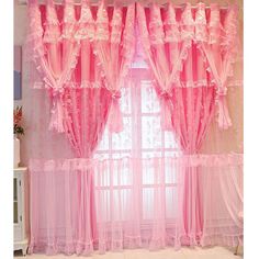 pink curtains with ruffles and lace on them