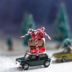 small toy cars with presents tied to them