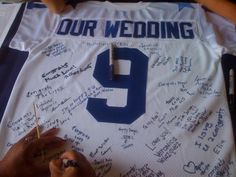 a football jersey with the number 9 written on it and people signing autographs for each player