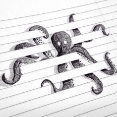 an octopus is drawn on lined paper