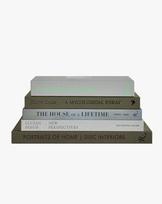 three books stacked on top of each other