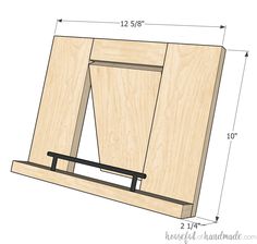 the back side of a wooden cabinet with measurements for the door and bottom section on it