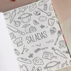 an open notebook with the words salads on it