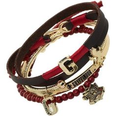 three different bracelets with charms and beads on each one side, including an anchor