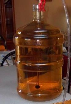 a large plastic jug sitting on top of a table