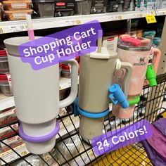 the shopping cart has two cups on it and one cup holder is attached to the handle