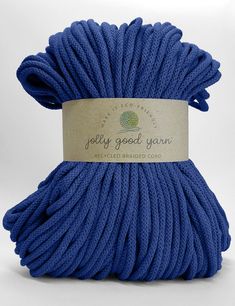 a blue yarn ball with the label jelly good yarn on it's front end