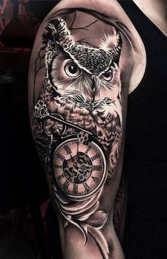 an owl with a clock on its arm is shown in black and grey tattoo style