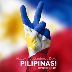 a hand making the peace sign in front of an philippines flag and text happy independence day