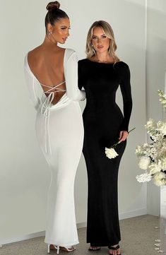 Feel sculpted and sexy in the Anastassia maxi, your new dress of dreams with long sleeves and a showstopping low back. Made from our signature double layered fabric, wear yours with loose waves and platform heels. 



Colour: Black.

Premium double layered fabric.

Moulds to body.

Long sleeves.

Super low back.

Tie detail at back.

Maxi length.

Model is an XS and is wearing an XS.

 Size: XS, S, M, L, XL, XXL Backless Mermaid Dress, Backless Long Sleeve, Backless Maxi Dress, Bodycon Maxi Dresses, Backless Maxi Dresses, Long Sleeve Bodycon, Glamorous Evening Gowns, Flowing Maxi Dress, Dress Designs