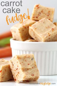 carrot cake fudge in a white bowl with carrots and celery behind it