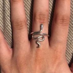 Brand New Silver Snake Ring. This Ring Is Really Cool And I Love How The Snake Looks! It Is One Size Fits All As Well. Also Comes In A Box! Adjustable Metal Snake Ring As Gift, Symbolic Adjustable Snake Ring Gift, Adjustable Symbolic Snake Ring Gift, Minimalist Silver Snake Ring As Gift, Symbolic Midi Rings As Gifts, Metal Snake Ring With Open Design For Gift, Metal Open Snake Ring For Gift, Snake Shape Metal Ring As Gift, Silver Snake Ring