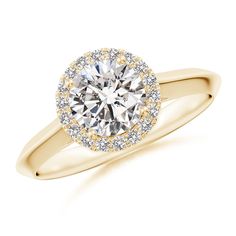 a yellow gold engagement ring with an oval diamond center and pave set diamonds around the shan shan shan shan shan shan shan shan shan shan shan shan shan shan shan shan shan shan