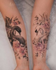 two flamingos with flowers on their legs are shown in this tattoo art photo shoot