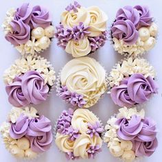 twelve cupcakes with purple and white frosting flowers on them are arranged in a square pattern