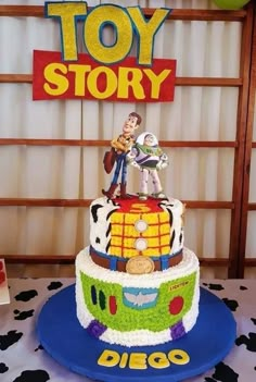 a toy story themed birthday cake on a table