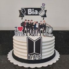 there is a cake that has been decorated with the image of bts on it