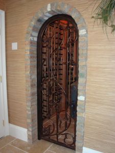 an iron door in the middle of a room