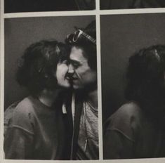 black and white photograph of two people with their faces close to each other, one kissing the other