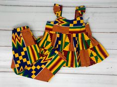 African print pants set. Ankara print top and pants set. 100%cotton. Fitted Multicolor Playwear Sets, Fitted Sets For Playwear, Printed Cotton Playwear Sets, Printed Cotton Sets For Playwear, Multicolor Matching Set For Playwear, Multicolor Playwear Sets, Cotton Matching Fitted Sets, Multicolor Cotton Matching Set Tops, Spring Cotton Sets In Multicolor Print